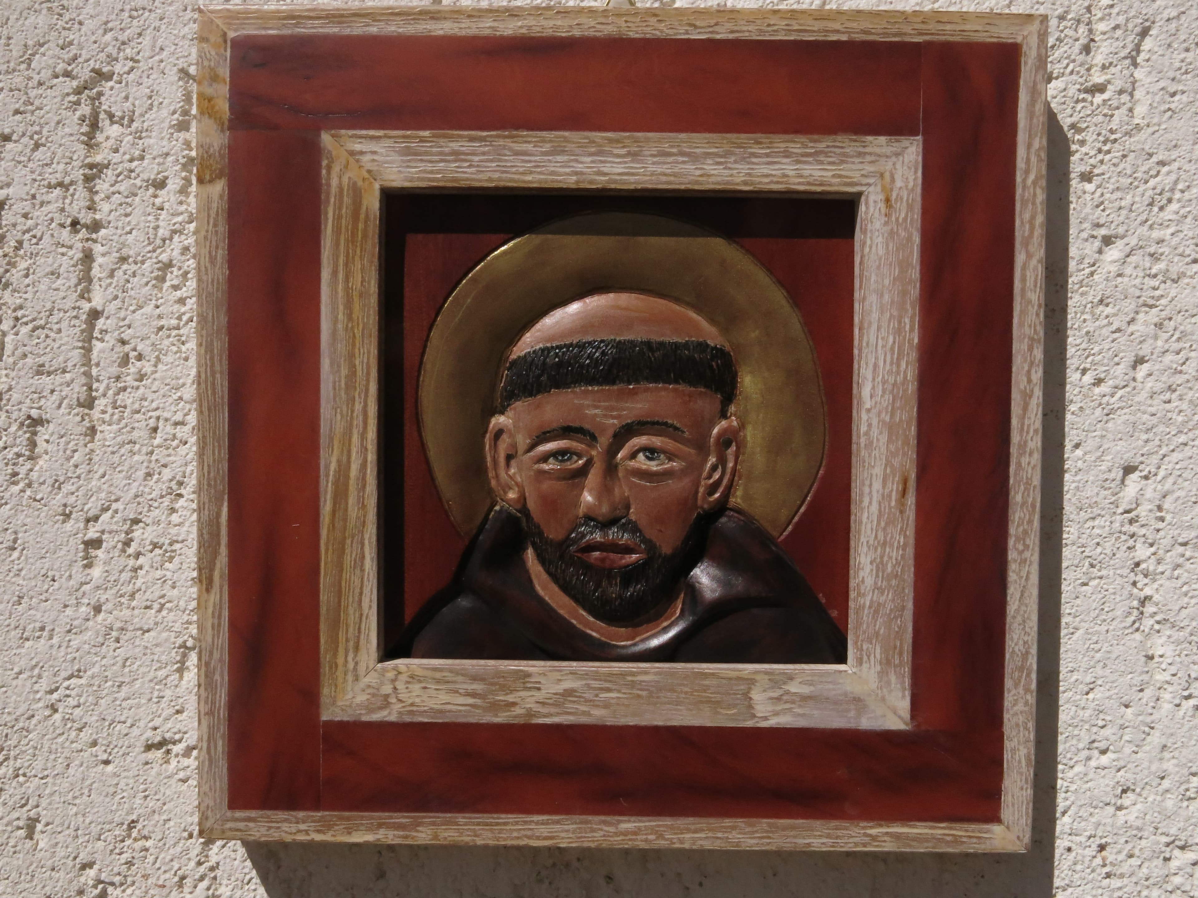 San Francesco: bassorilievo in ebano e teak